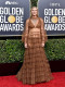 Gwyneth Paltrow ruháját nem tudjuk megmagyarázni, ahogy arra sem találunk szavakat, hogyan választhatott a színésznő ennyire előnytelen estélyit. Karcsú alakjához egyáltalán nem passzolt ez a függönyre hajazó dressz.