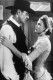 Az akkor 51 éves Gary Cooperrel az 1952-es Délidő című filmben játszott együtt a 22 esztendős színésznő, aki köztudottan vonzódott az idősebb férfiakhoz. A viszony a forgatással együtt be is fejeződött, de a férfi tíz évvel később még tett egy kissé udvariatlan megjegyzést a szépséges Kellyről. „Férfitársaságban úgy nézett ki, mint egy kihűlt étel, egészen addig, míg le nem került róla a ruha. Akkor kivirult” – állította Cooper.