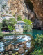 Blagaj, Bosznia-Hercegovina 

Blagaj egy vízesésekkel és csodálatos kék égbolttal körülvett apró falucska, a sziklák között megbújó fehér házak és a kolostor látványa pedig olyan, mintha a helyet megfestették volna. Egy biztos: az összkép minden idelátogatót magával ragad, hiszen egy földi paradicsomról van szó. A dervisek és szúfik számára pedig egy szent hely, ezért békéje is sértetlen.