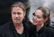 Brad Pitt és Angelina Jolie - a hajstílusuk szinte mindig egyezett. Itt éppen hátranyalt frizurával állnak egy bemutatón