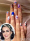 Katy Perry az őrült körmök híve. Az énekesnő mindig valamilyen dekadens manikűrt készíttet magának, ez az Obamás verzió például mindent visz.