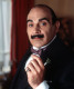 1987-ben kérték fel először Hercule Poirot megszemélyesítésére, akit 1989-től kezdve kisebb-nagyobb megszakításokkal egészen 2013-ig alakított, összesen 70 epizódban. Suchet nagyon akkurátusan készült a szerepre, hogy minél hitelesebb legyen, ez is hozzájárult a sorozat sikeréhez, és ez tette nemzetközileg ismert sztárrá. A színész annyira eggyé vált a karakterrel, hogy könyvet is írt róla Poirot és én címmel.