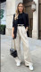 2. Széles szárú nadrágok

Nyáron a széles szárú nadrágok nem csupán divatosak, hanem kényelmes és sokoldalú viseletet is jelentenek. Ahhoz, hogy a legtöbbet hozzuk ki belőlük, egyszerű, de stílusos felsőkkel kombinálni őket, mint például laza pólók vagy pamut blúzok. Egy hosszú nyaklánccal vagy egy nagyobb karkötővel könnyen feldobhatjuk megjelenésünket. Az is fontos, hogy figyeljünk az összhangra: ha a nadrágunk hosszabb, magas sarkú cipővel párosítva nyújtja legjobban a lábunkat, míg laposabb cipőkkel egy laza, bohém hatás érhető el.