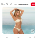 A látványos fotózás a Calzedonia számára készült egy tengerparti háttér előtt. Heidi különböző, igencsak keveset takaró fürdőruhákban pózolt, amelyek finoman hangsúlyozták formás alakját és napbarnított bőrét. Az egyik emlékezetes összeállításban egy lágy elefántcsontszínű, pánt nélküli bikini szerepelt, arany részletekkel díszítve. A letisztult szabás minden figyelmet irigylésre méltó alakjára irányította, amin – nem túlzás azt állítani –, hogy jóformán bármilyen szabású, színű és mintájú ruhadarab úgy áll, ahogy az a nagykönyvben meg van írva.
