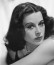 Hedy Lamarr 1940-ben egészségügyi tanácsért fordult szomszédjához, George Antheilhez, aki a zongoraművészet mellett a női&nbsp;endokrinológia&nbsp;szakértője is volt, és csak később került szóba közöttük a torpedók irányítási problémája. A torpedók rádióvezérlését már az&nbsp;első világháború&nbsp;végén is használták, de ezeket könnyű volt eltéríteni a&nbsp;frekvencia&nbsp;zavarásával. Ez ellen azt találták ki, hogy a frekvenciát gyorsan váltogassák az adónál és a vevőnél egyidejűleg,&nbsp;lyukszalag&nbsp;segítségével. Ehhez Antheil főműve&nbsp;(Ballet Mécanique)&nbsp;adta az ötletet, amelyben több&nbsp;gépzongora&nbsp;is szerepel. Mivel a zongorán 88 billentyű van, a torpedóvezérlő találmány leírásában is 88 frekvenciát használtak. Ennyi frekvencia egyidejű zavarásához már túl sok energiára lett volna szükség abban az időben, az egyes frekvenciák pedig kiszámíthatatlanok voltak, mivel azok az egyedi lyukszalagok szerint változtak folyamatosan.
