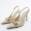 ZARA Leather slingback heel with chain detail 19 995 Ft
ZARA Leather slingback heel with chain detail 19 995 Ft