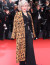 A filmfesztiválra egy fekete, hosszú ujjú, V-nyakú, virágokkal és gyöngyökkel díszített Elie Saab kezeslábasban érkezett, ami mesésen illett karcsú alakjára. Az outfitet egy állatmintás kabáttal egészítette ki, kiegészítőknek pedig ezüst ékszereket és magassarkút választott.
