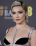 Hullámos pixie
A karakteres hullámokkal megformázott pixie frizura az egyik legnőiesebb módja a rövid haj viselésének, erre pedig Florence Pugh tökéletes példa. A színésznő 2022-ben és 2023-ban több sajtókörút során is ezt a lágyan hullámos pixie fazont viselte, amely azóta szinte a védjegyévé vált. A játékos textúra és a lazán formázott hullámok különleges eleganciát adnak a rövid frizurának, miközben modern, effortless hatást keltenek.
Hullámos pixie
A karakteres hullámokkal megformázott pixie frizura az egyik legnőiesebb módja a rövid haj viselésének, erre pedig Florence Pugh tökéletes példa. A színésznő 2022-ben és 2023-ban több sajtókörút során is ezt a lágyan hullámos pixie fazont viselte, amely azóta szinte a védjegyévé vált. A játékos textúra és a lazán formázott hullámok különleges eleganciát adnak a rövid frizurának, miközben modern, effortless hatást keltenek.